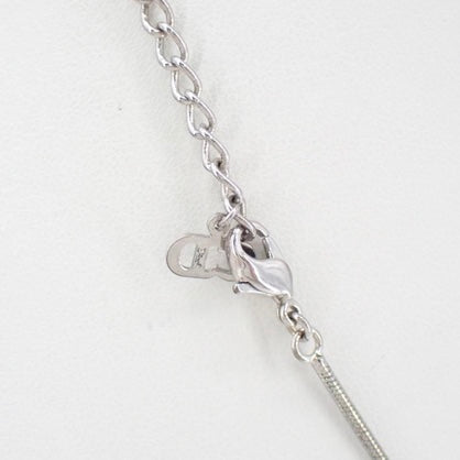 christian dior silver tone “d” logo necklace