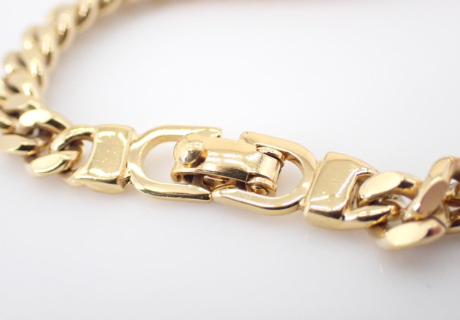 christian dior gold toned plate bracelet