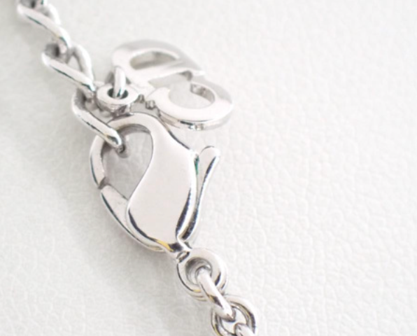 christian dior vintage silver logo neckace