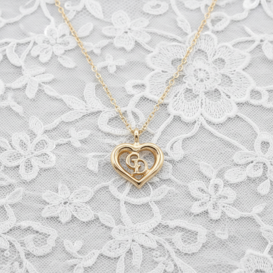 vintage dior heart shaped “cd” necklace