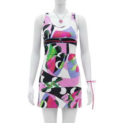 Mannequin wearing a colorful abstract patterned dress on a white background