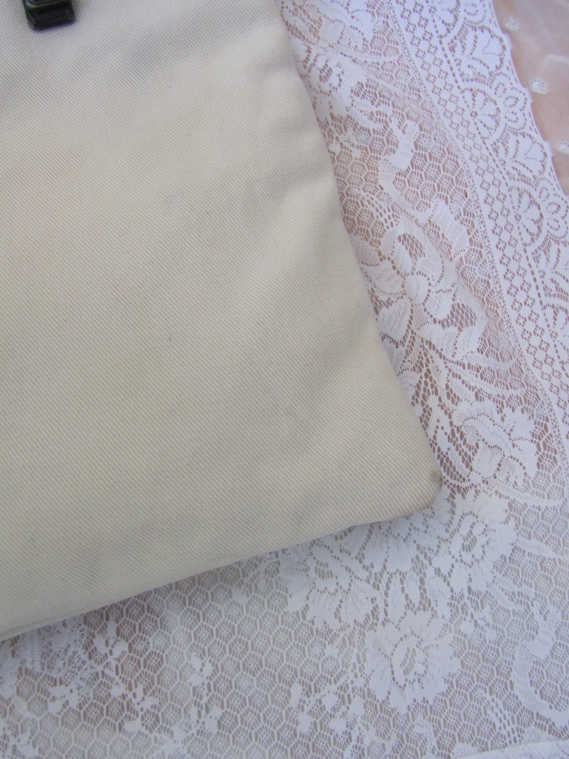 Beige tote bag   on a textured white background