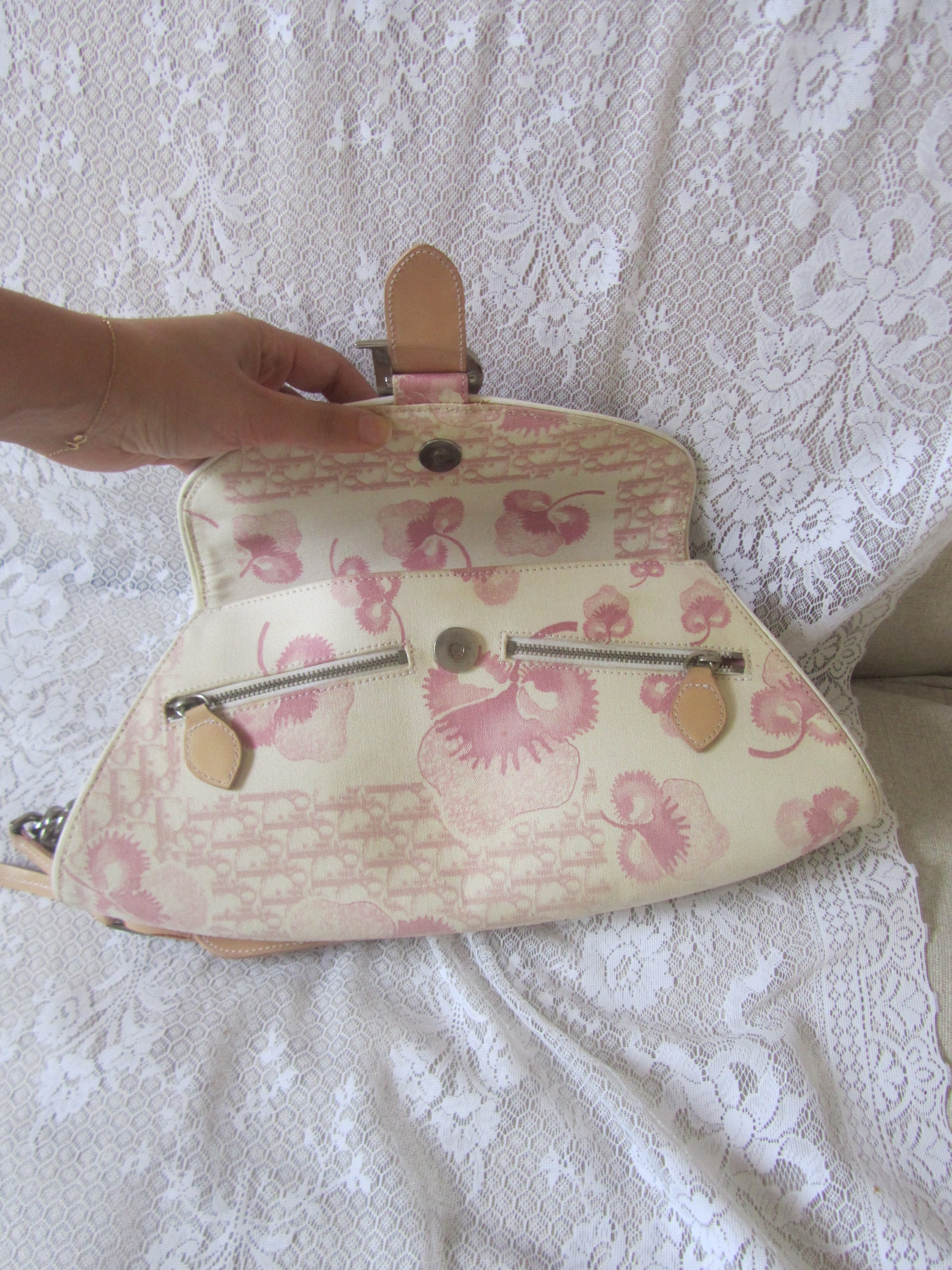 Floral-patterned bag on a textured surface