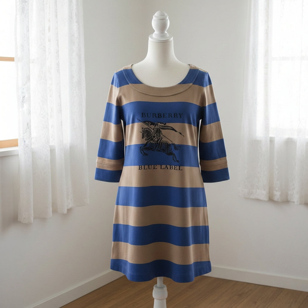 Striped dress on a mannequin against a white wall
