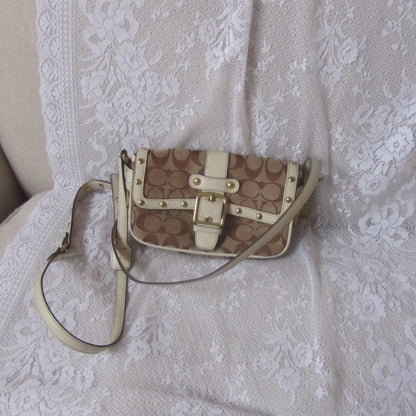 Patterned handbag on a textured white surface