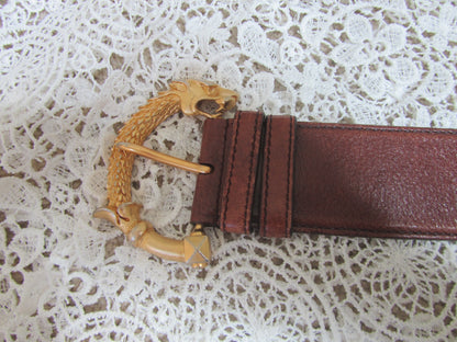 gold belt buckle on lace background