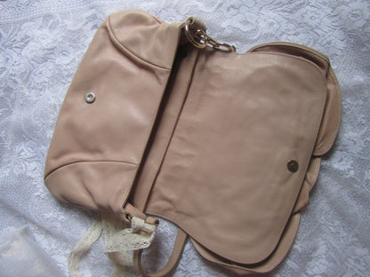 Beige bag on a textured surface