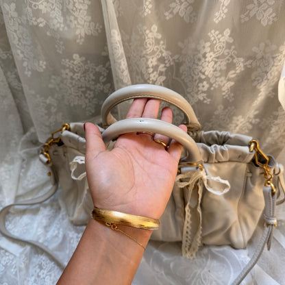 xovintage VINTAGE MIU MIU IVORY LEATHER RUCHED VITELLO BAG - Handbags