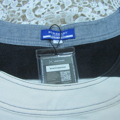 Gray t-shirt with Burberry tag and QR code label on a lace background