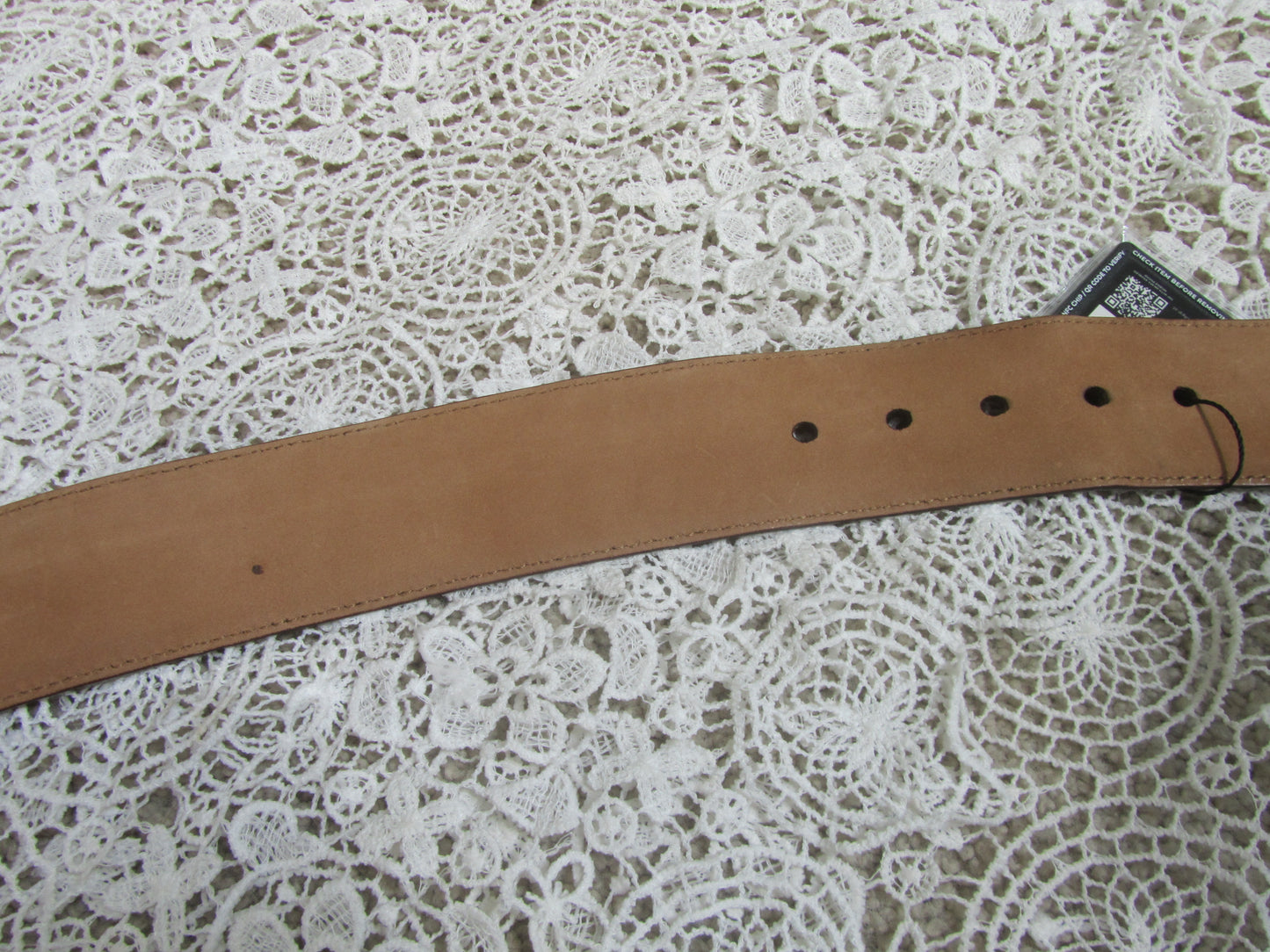 brown belt on lace background