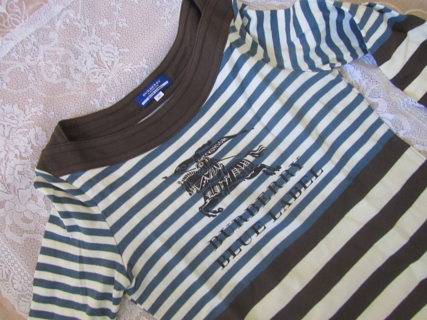 Striped shirt with a graphic design on a textured surface