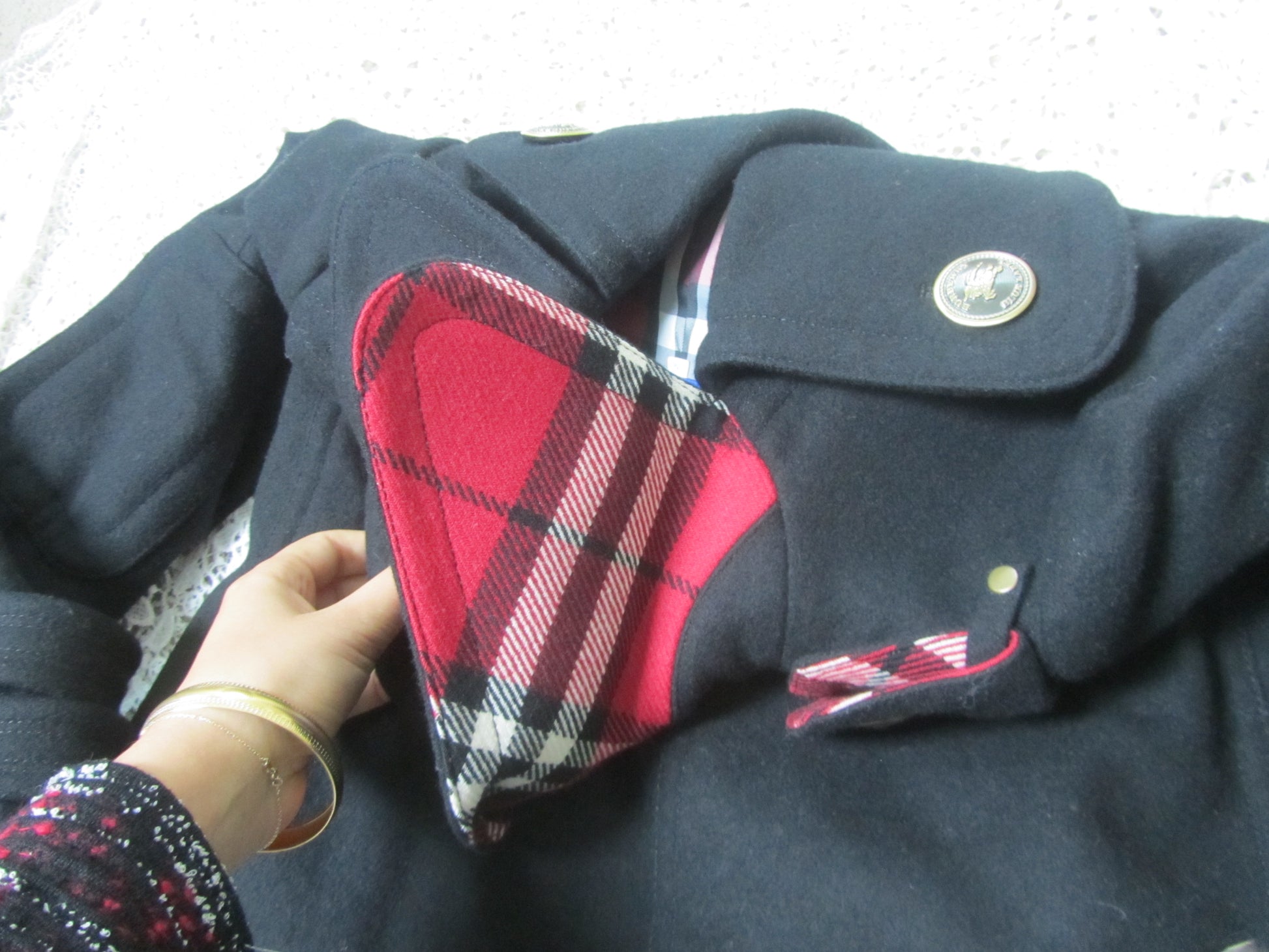 black peacoat with plaid red interior