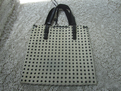  polkadot tote bag  on a lace background 