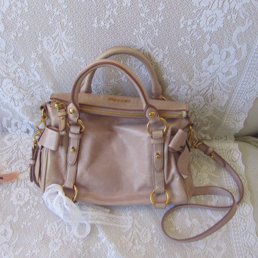 miu miu pale pink vintage vitello mini bow bag