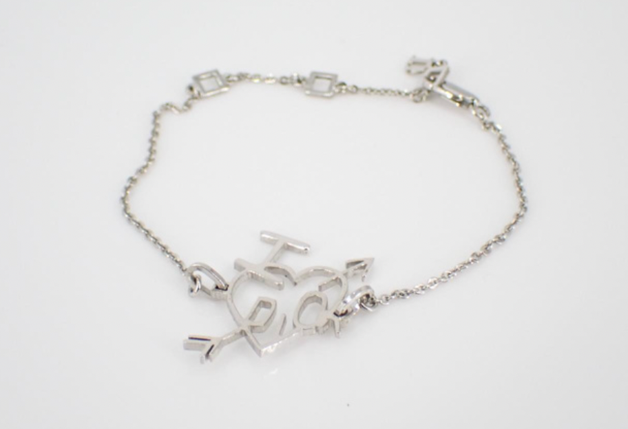 christian dior silver heart & arrow bracelet