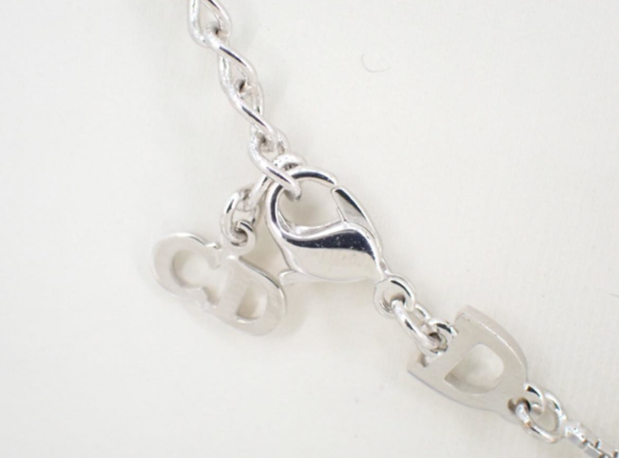 christian dior silver cross necklace