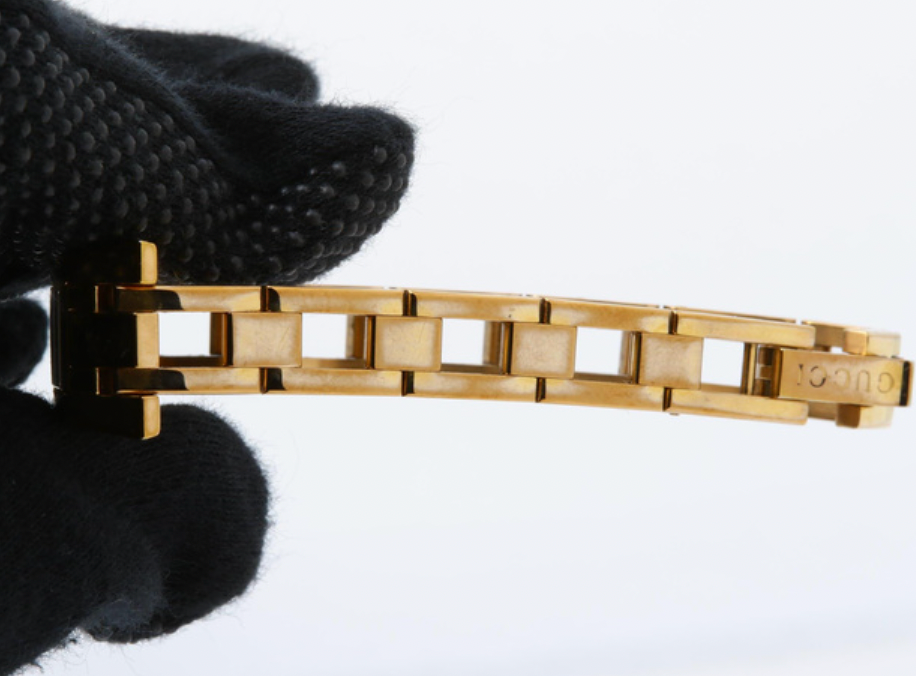 gucci gold-tone pink bracelet watch