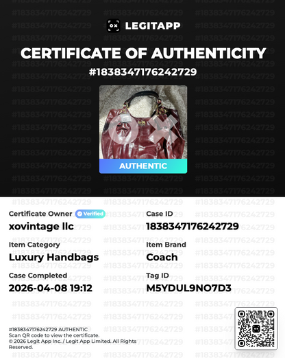 Certificate of Authenticity for a luxury handbag with branding and verification details.