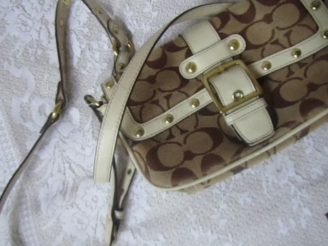 Patterned handbag on a textured white surface