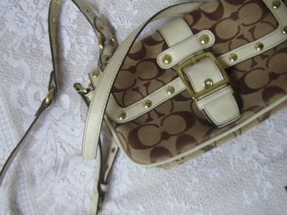 Patterned handbag on a textured white surface